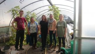 Pathways to farming team with Helen and Dan from Farmstart in a polytunnel in Stockport
