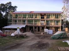 A strawbale building under construction at Sieben Linden eco-village in Germany 